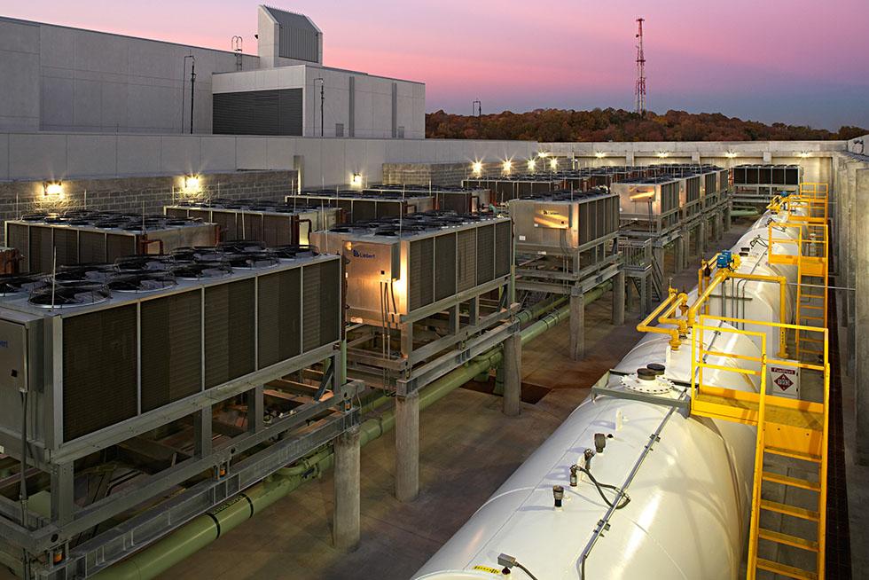 The secure walled mechanical yard is home to the redundant mechanical and electrical equipment